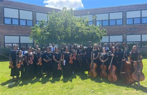 Orchestra students posing at Cedar Point
